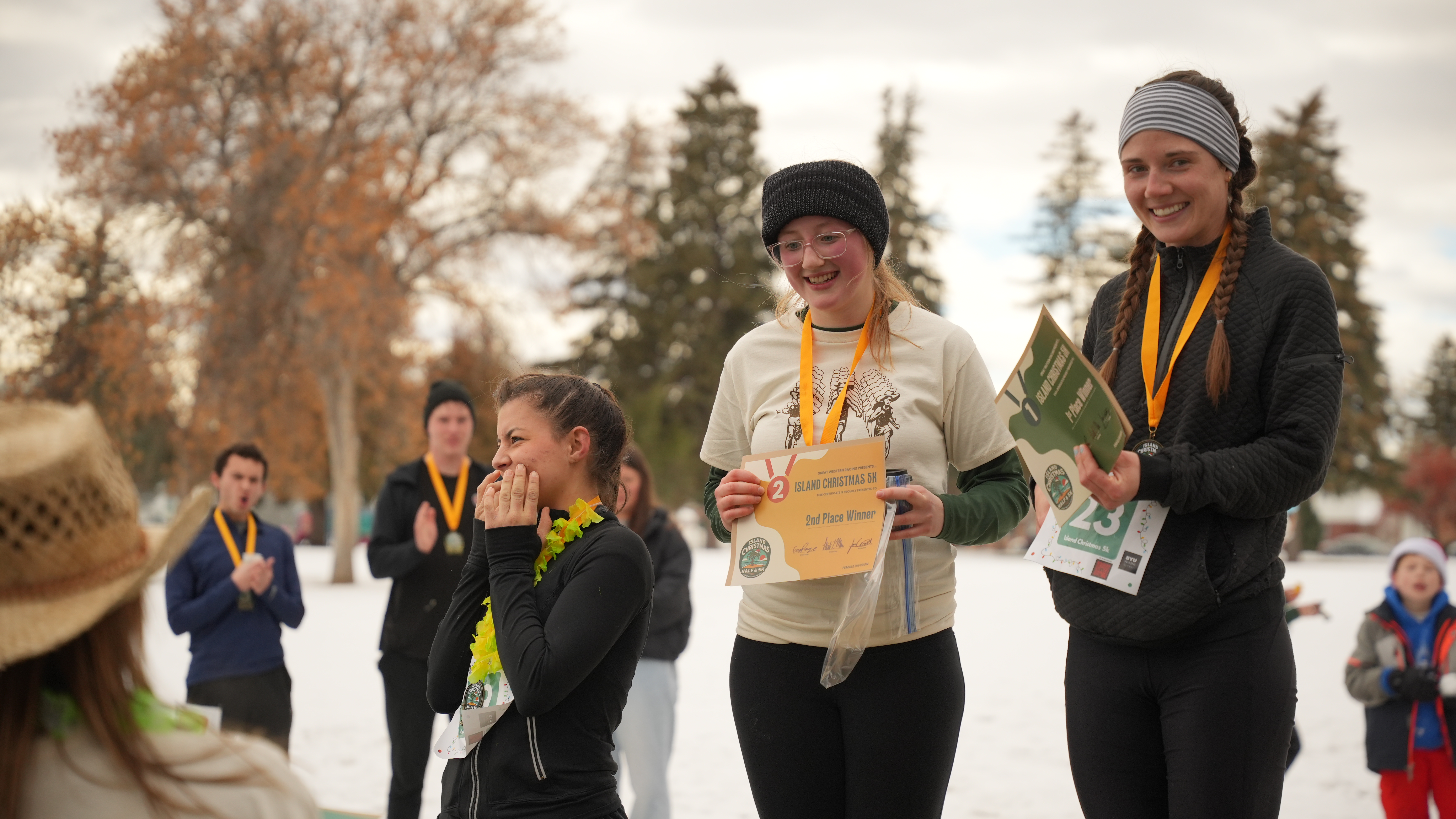 happy people on the winners' podium